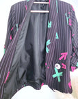 Blazer noir à tags fluo