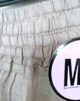 Pantalon taupe à bandes fluo