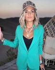 Veste cintrée verte avec pins éclair