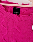 Pull torsadé fuchsia