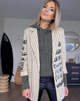 Veste boy à rayures et tags
