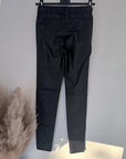 Pantalon legging noir huilé