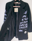 Veste noire à tags parmes