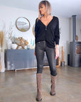 Pantalon noir huilé