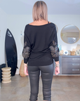 Pantalon noir huilé