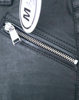 Pantalon noir huilé