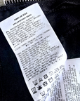 Pantalon noir huilé