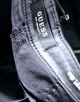 Pantalon noir huilé