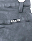 Pantalon noir huilé