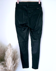 Pantalon noir huilé