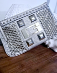 Pochette star cloutée