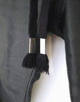 Pantalon slim noir huilé