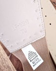 Ceinture élastique beige à boucle dorée