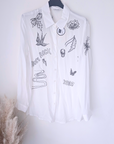 Chemise blanche à perles bijoux