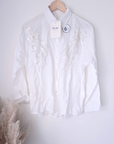 Chemise blanche à perles translucides - 𝐌𝐚𝐫𝐢𝐧𝐚𝟒𝟒𝐟𝐚𝐦𝐢𝐥𝐲