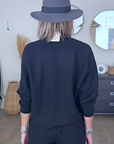 Pull noir col cheminé