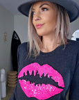 Pull bouche rose fluo