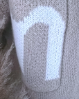 Gilet tags en maille