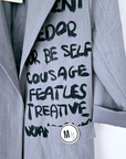 Veste grise à tags
