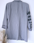 Veste grise à tags