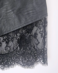 Jupe noire asymétrique avec dentelle