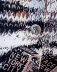 Veste cintrée à imprimé et strass