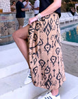 Jupe beige à imprimé noir - 𝐌𝐚𝐫𝐢𝐧𝐚𝟒𝟒𝐟𝐚𝐦𝐢𝐥𝐲