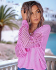 Pull ajouré rose