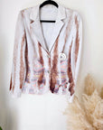 Veste cintrée tie and dye munie de strass au dos.