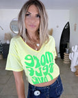 T-shirt jaune à inscription fluo