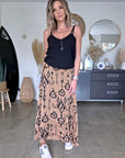 Jupe beige à imprimé noir