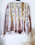 Veste cintrée tie and dye munie de strass au dos.