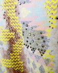 Veste cintrée tie and dye munie de strass au dos.