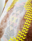 Veste cintrée tie and dye munie de strass au dos.