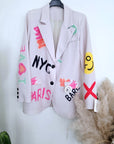 Veste beige à tags et inscriptions fluo