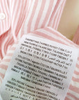 Chemise rayée rose à inscription au dos