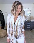 Veste cintrée tie and dye munie de strass au dos.