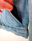 Veste en jean à inscriptions en perles