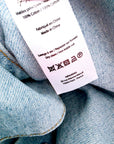 Veste en jean à inscriptions en perles