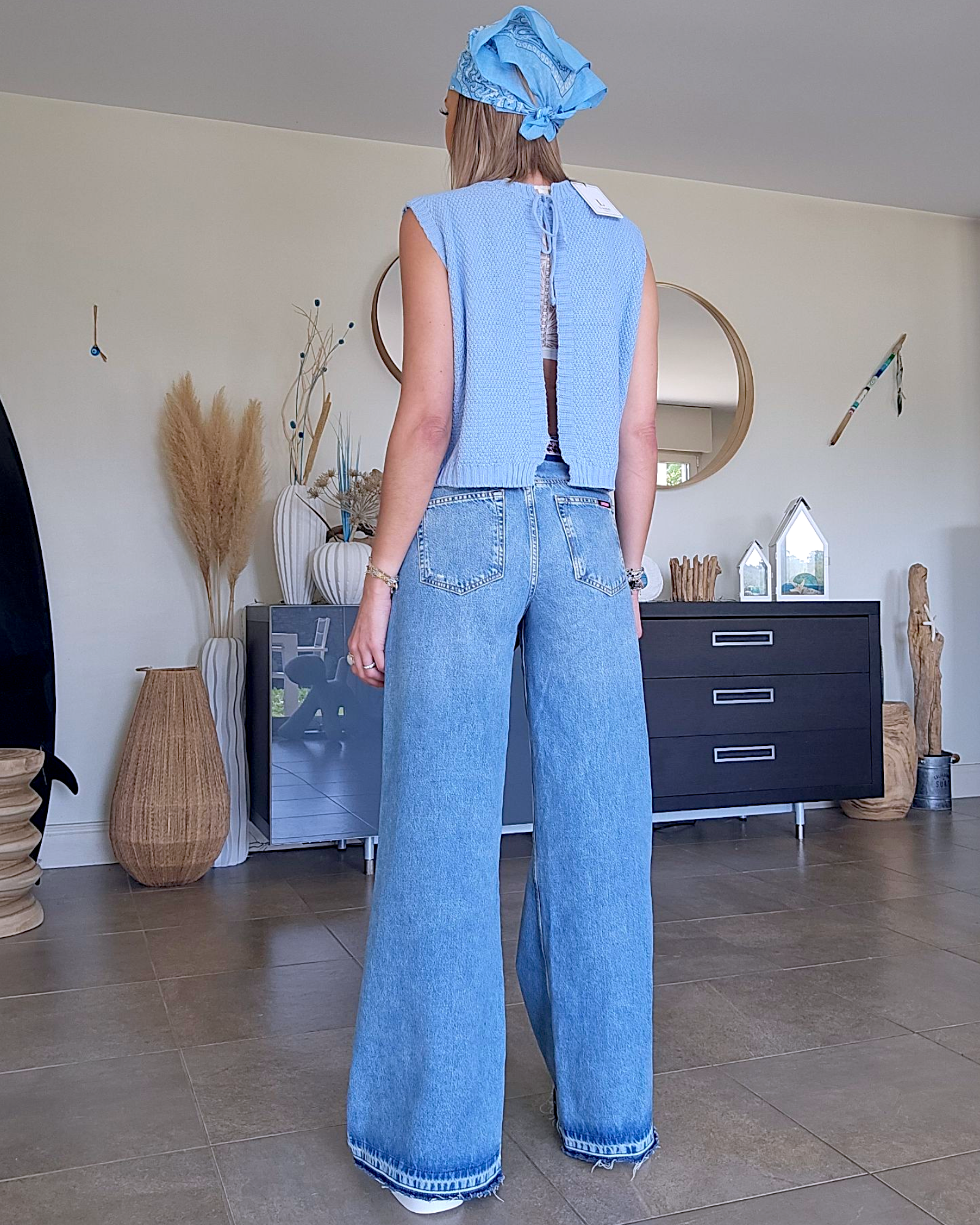 Pull bleu ciel dos nu