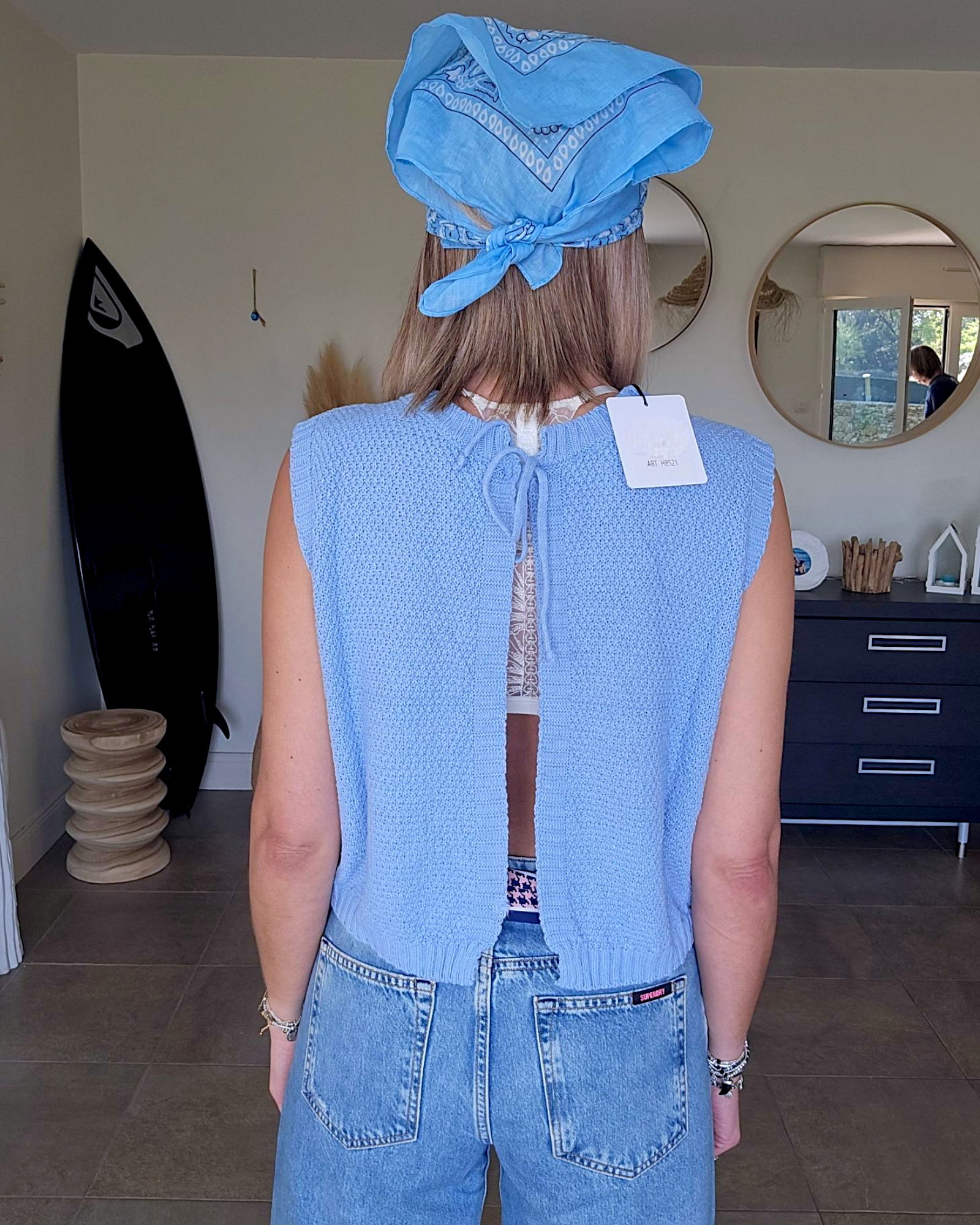 Pull bleu ciel dos nu