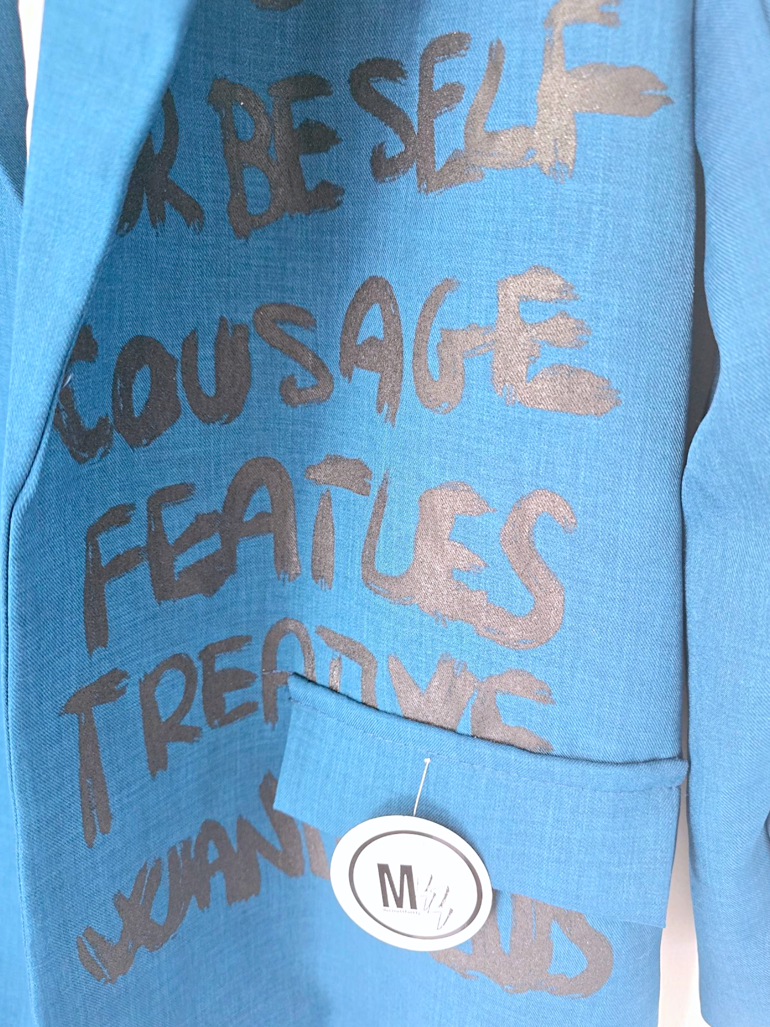 Veste boy bleu à tags