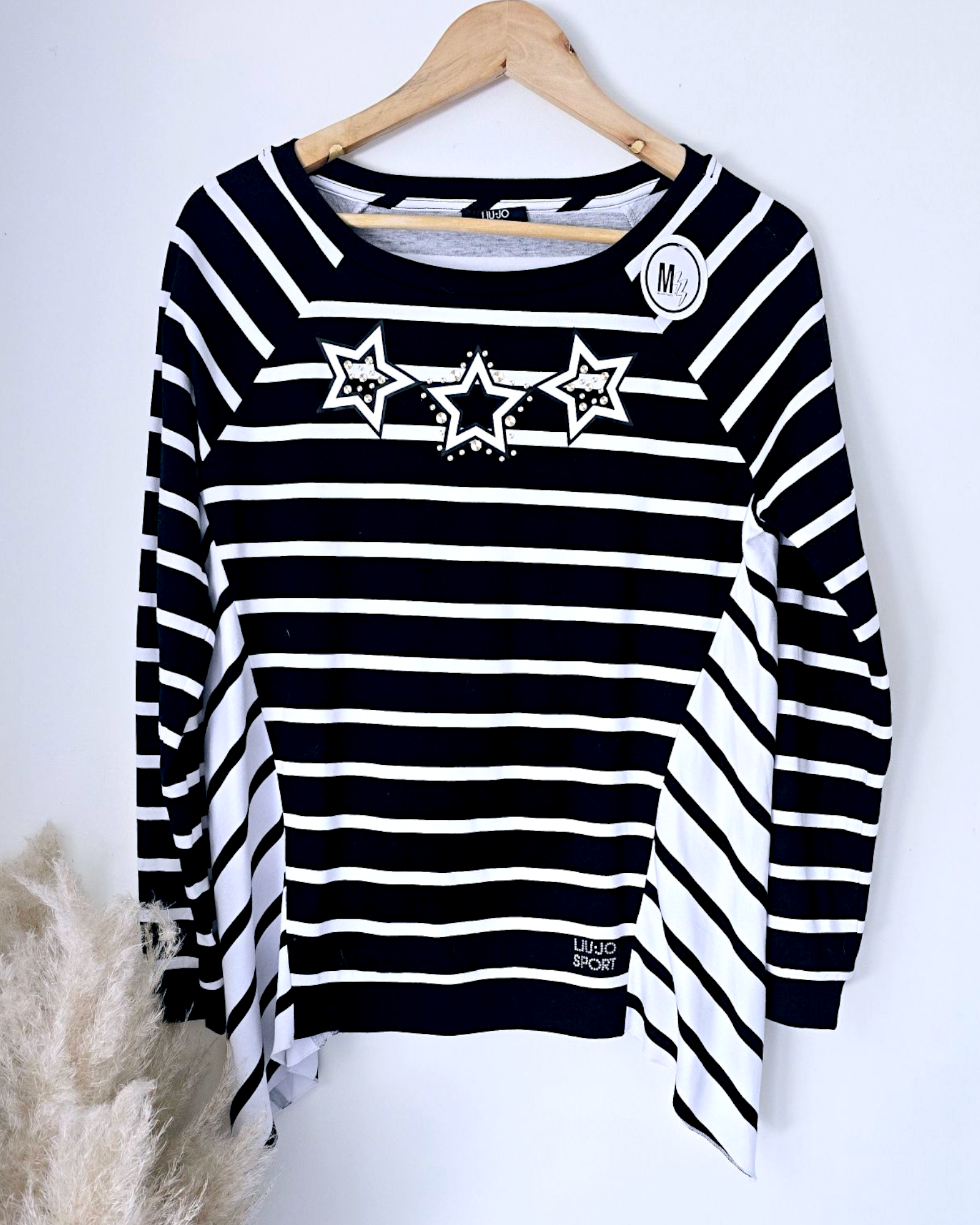 Sweat fin asymétrique