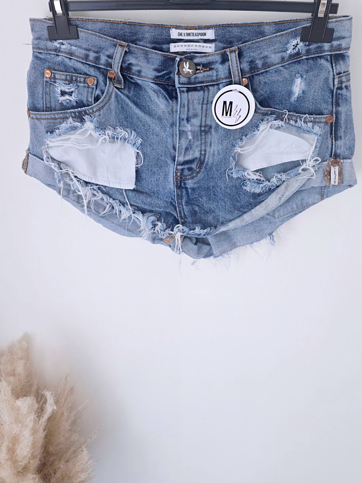 Short destroy en denim