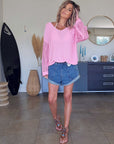 Pull ajouré rose