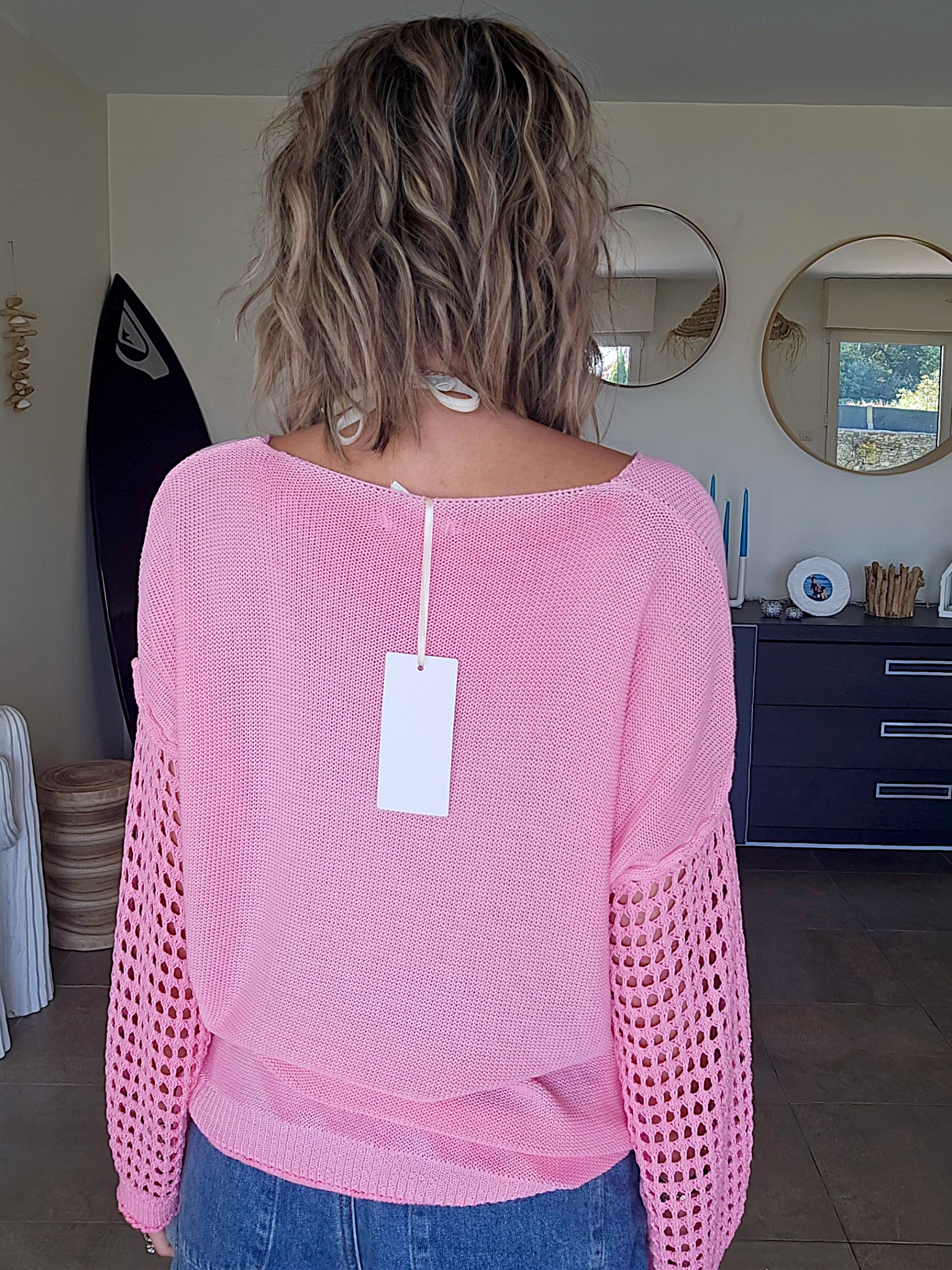 Pull ajouré rose
