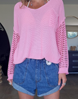 Pull ajouré rose