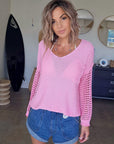 Pull ajouré rose