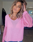Pull ajouré rose
