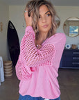 Pull ajouré rose